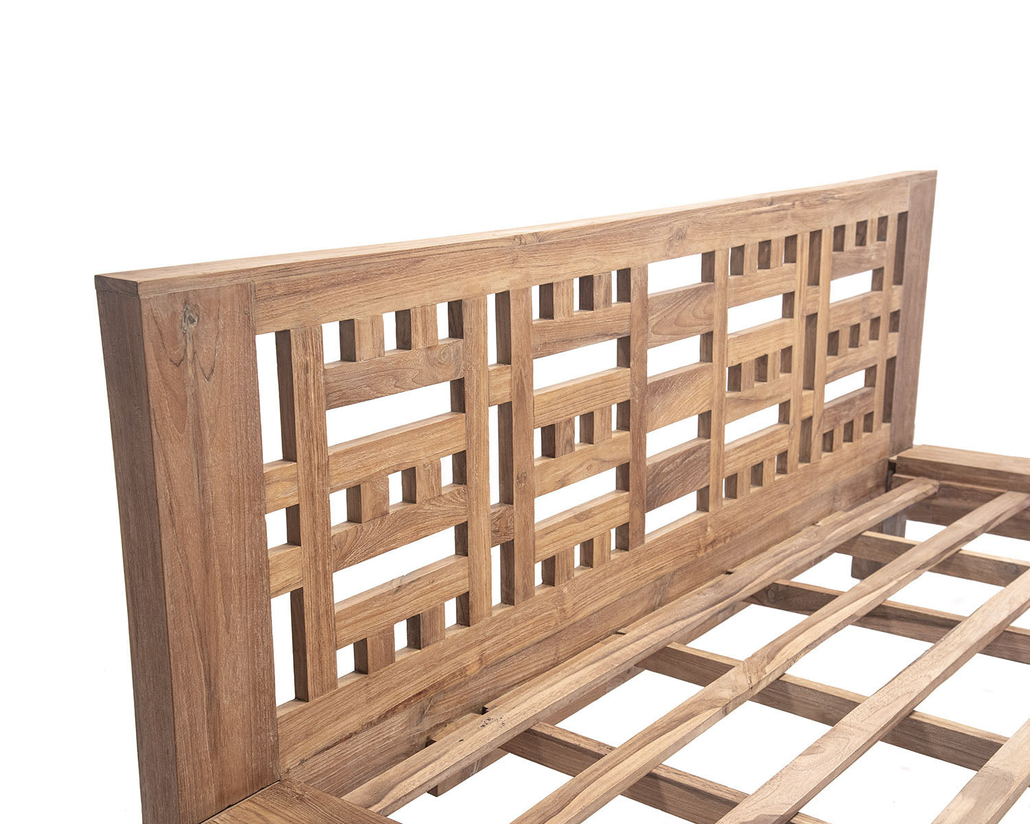 A natural color teak wood bed frame with a wooden headboard, featuring a slatted base and a rectangular shape.