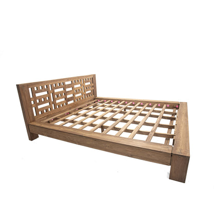A natural color teak wood bed frame with a wooden headboard, featuring a slatted base and a rectangular shape.