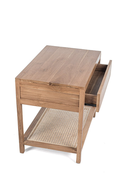 A rectangular side table made of teak wood with a rattan drawer, featuring a natural color and a slim profile.