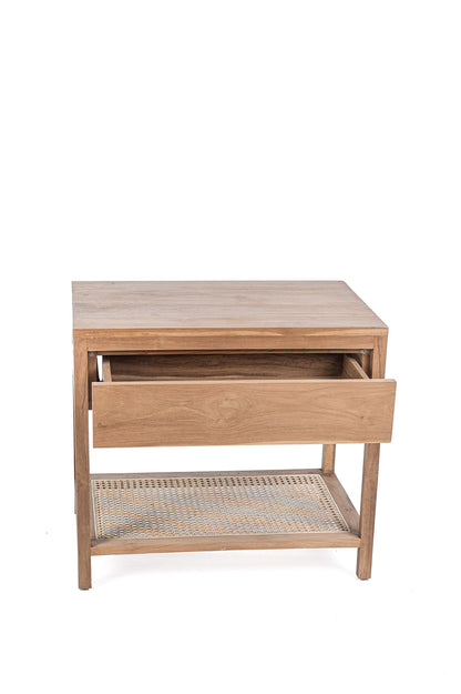 A rectangular side table made of teak wood with a rattan drawer, featuring a natural color and a slim profile.