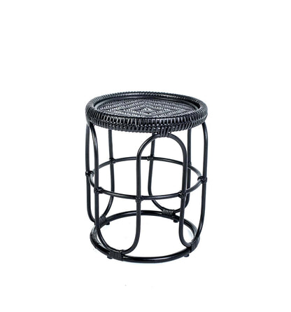 Black woven side table on a white background