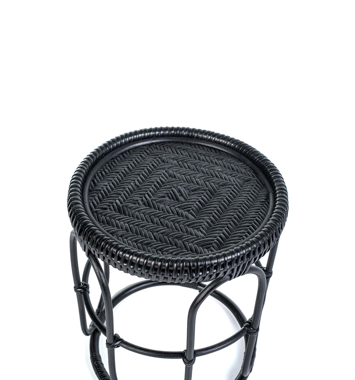 Black woven stool on a white background