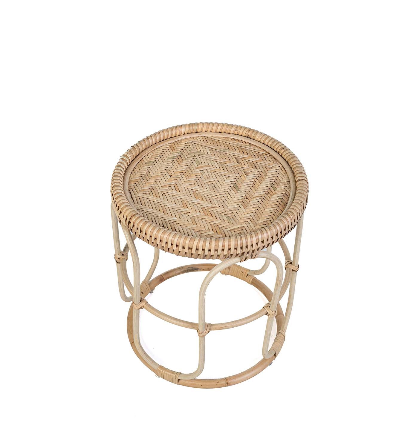 Woven rattan stool on a white background