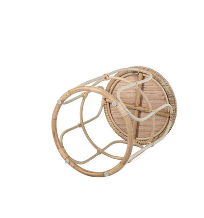 Set of two round rattan coasters on a white background