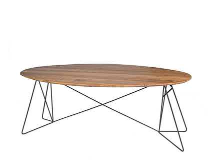 Table made of exotic wood and featuring sleek iron legs on a white background.