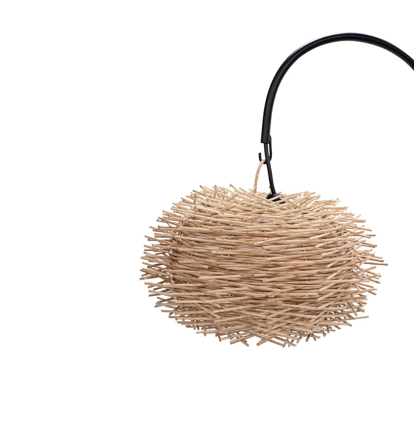 Woven basket with a black handle on a white background