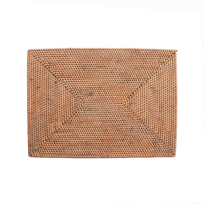 A natural color rectangular rattan table mat with intricate weaving techniques.