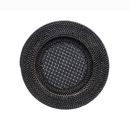 A round black rattan tray handcrafted with a geometric pattern.