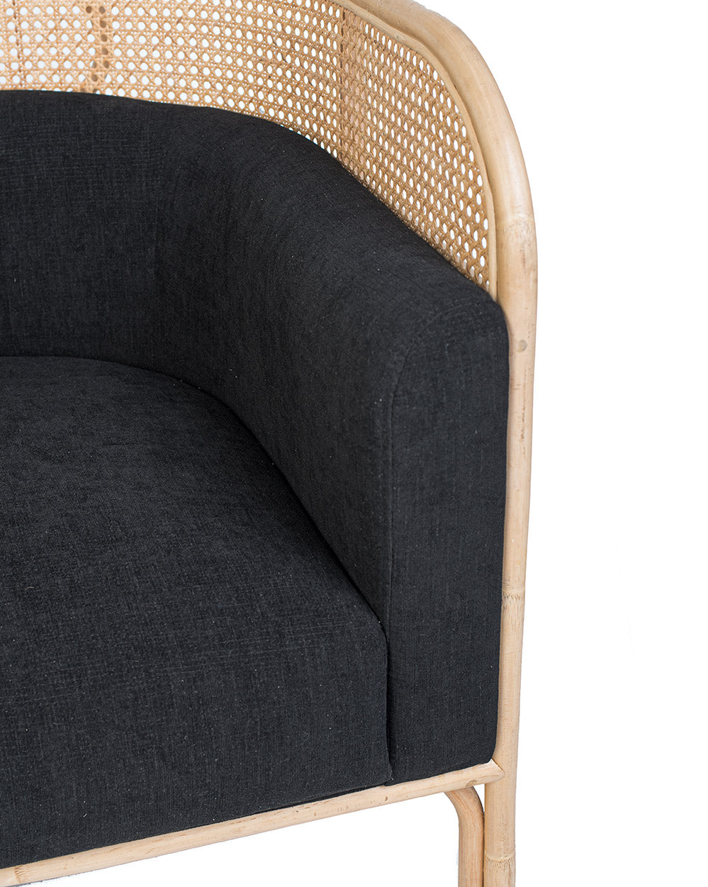 A contemporary style solo sofa with a black cushioned seat and backrest, made of rattan.