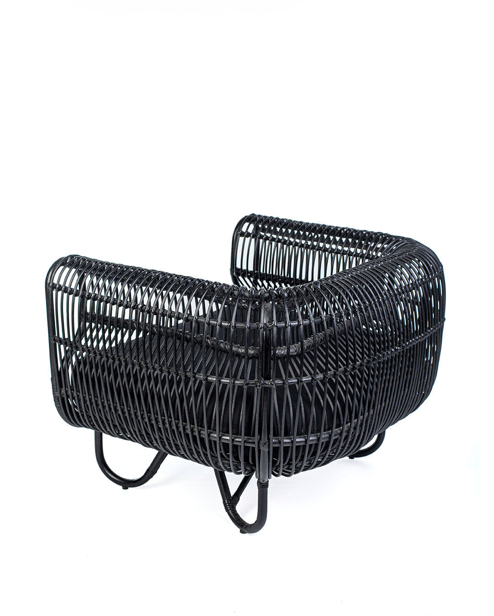 A black rattan solo sofa with a cushion on a white background, showcasing a woven design and a sleek modern look.