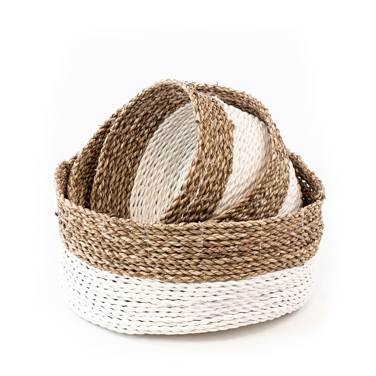 Set of three handwoven baskets made from twisted rattan and macrame, in natural and white colors, displayed on a white background.