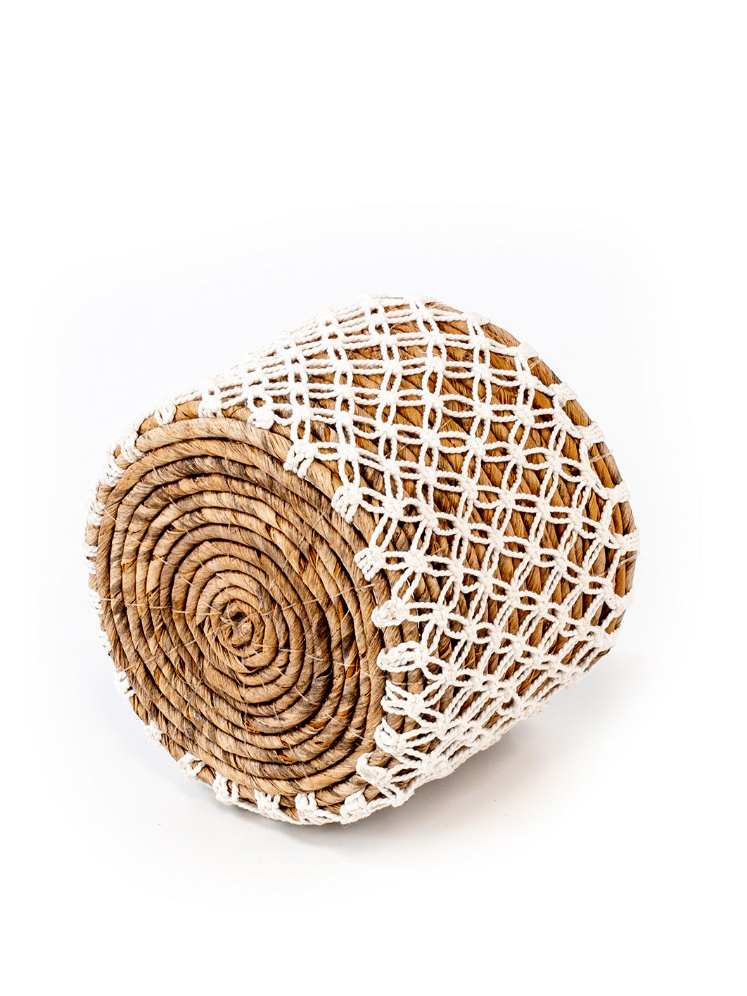 One woven small basket handcrafted from banana leafs and macrame. 