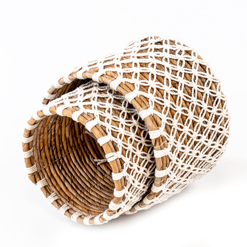 Two woven small baskets handcrafted from banana leafs and macrame. 