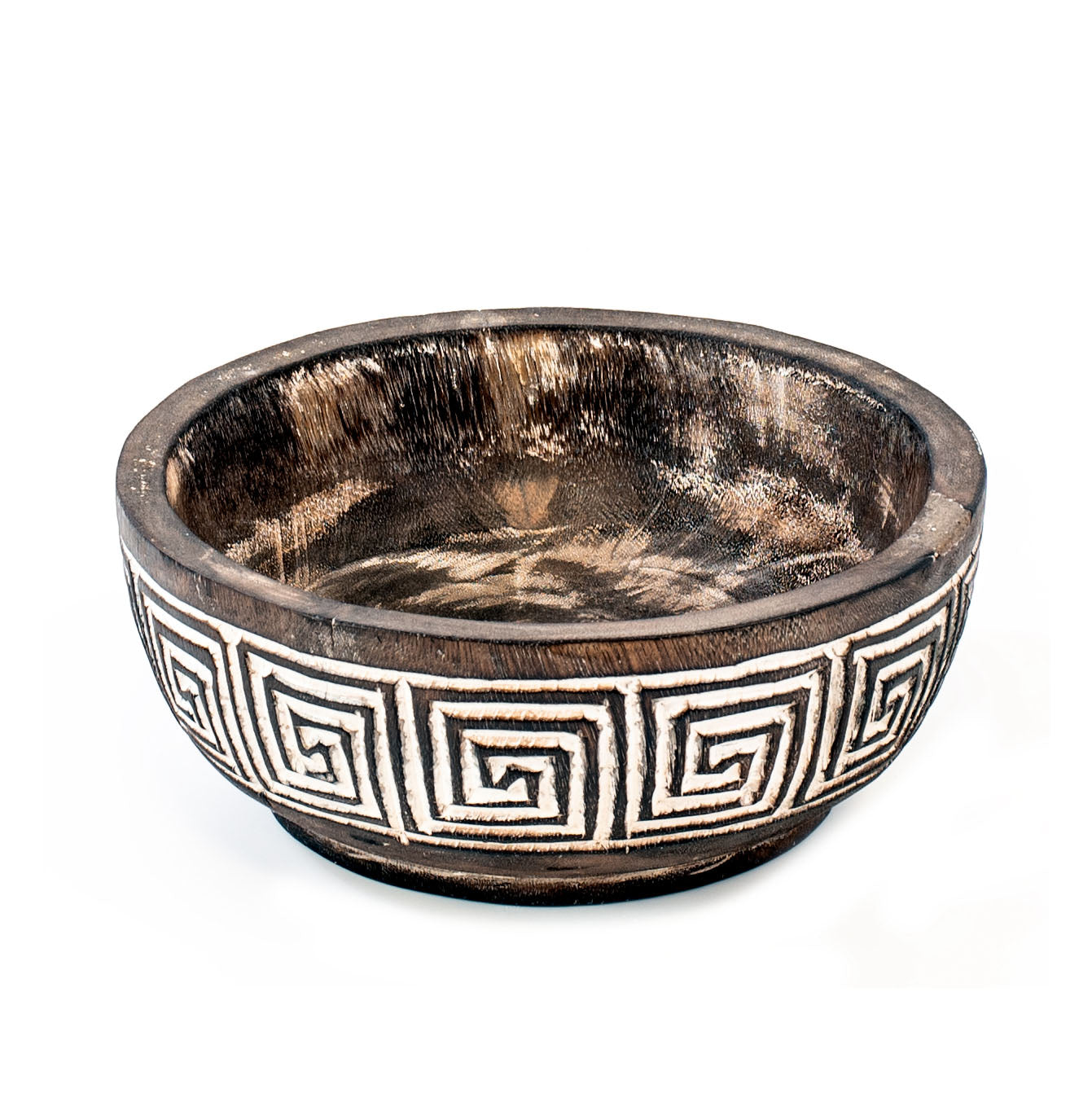 A hand-carved wooden bowl with geometric patterns, primarily in brown color with white accents.