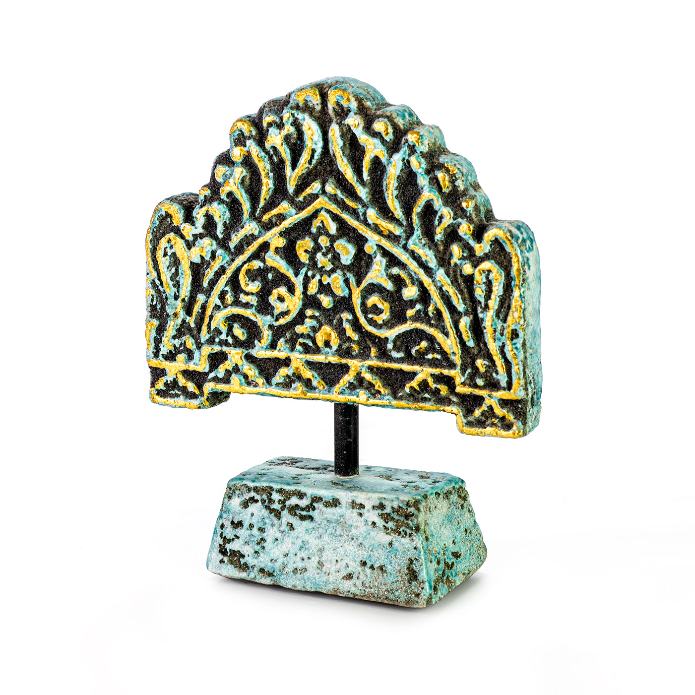 Handmade ceramic decorative piece with geometric antique ethnic motifs in green color with a gold relief, mounted on a flat base.