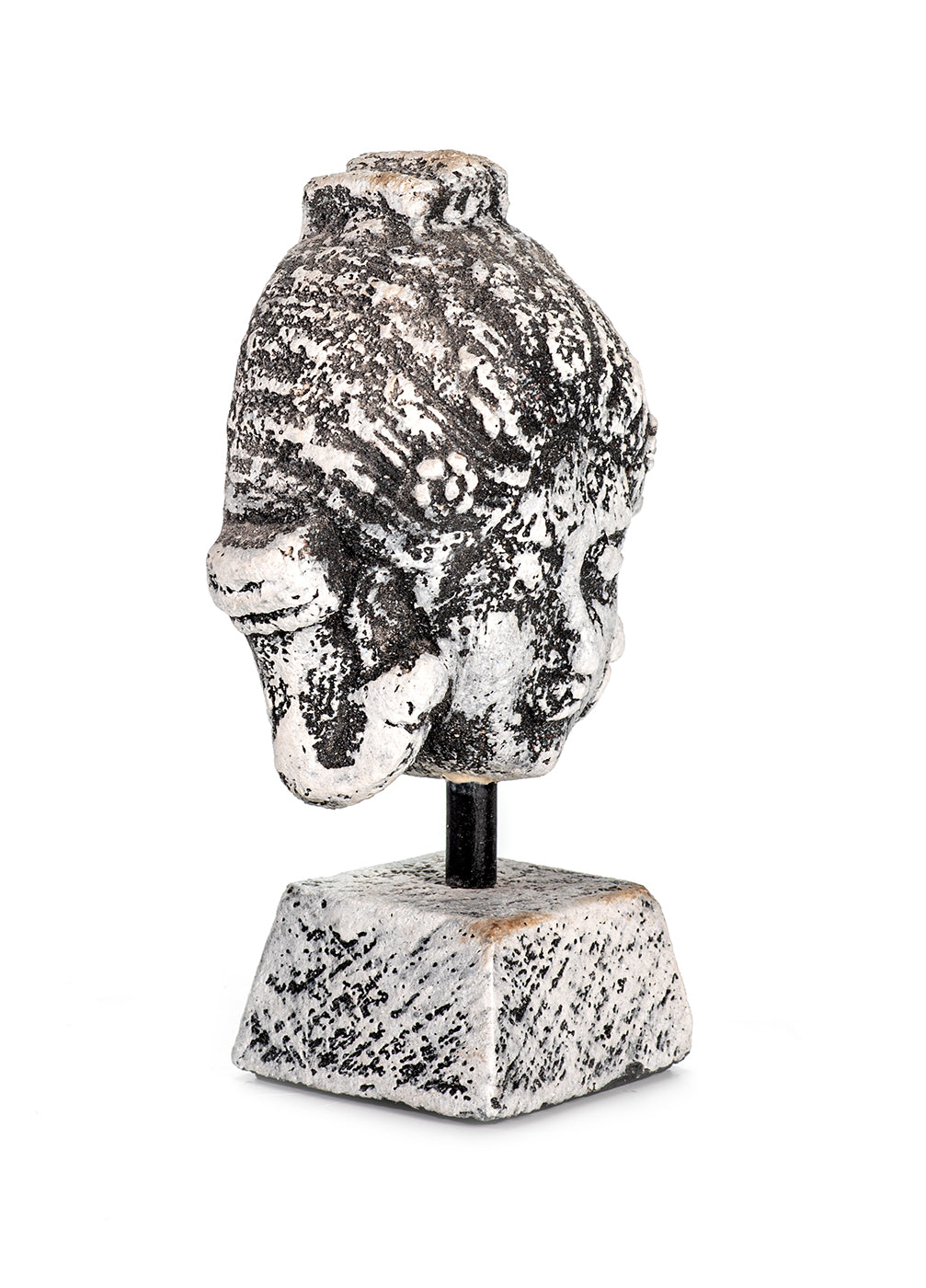 A ceramic fragment depicting an ancient deity in antique grey color, mounted on a stand.