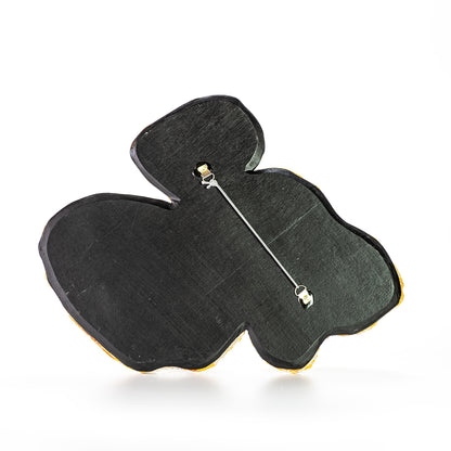 Hand painted ceramic wall decoration depicting marine coral elements in rose ash color, backside view.