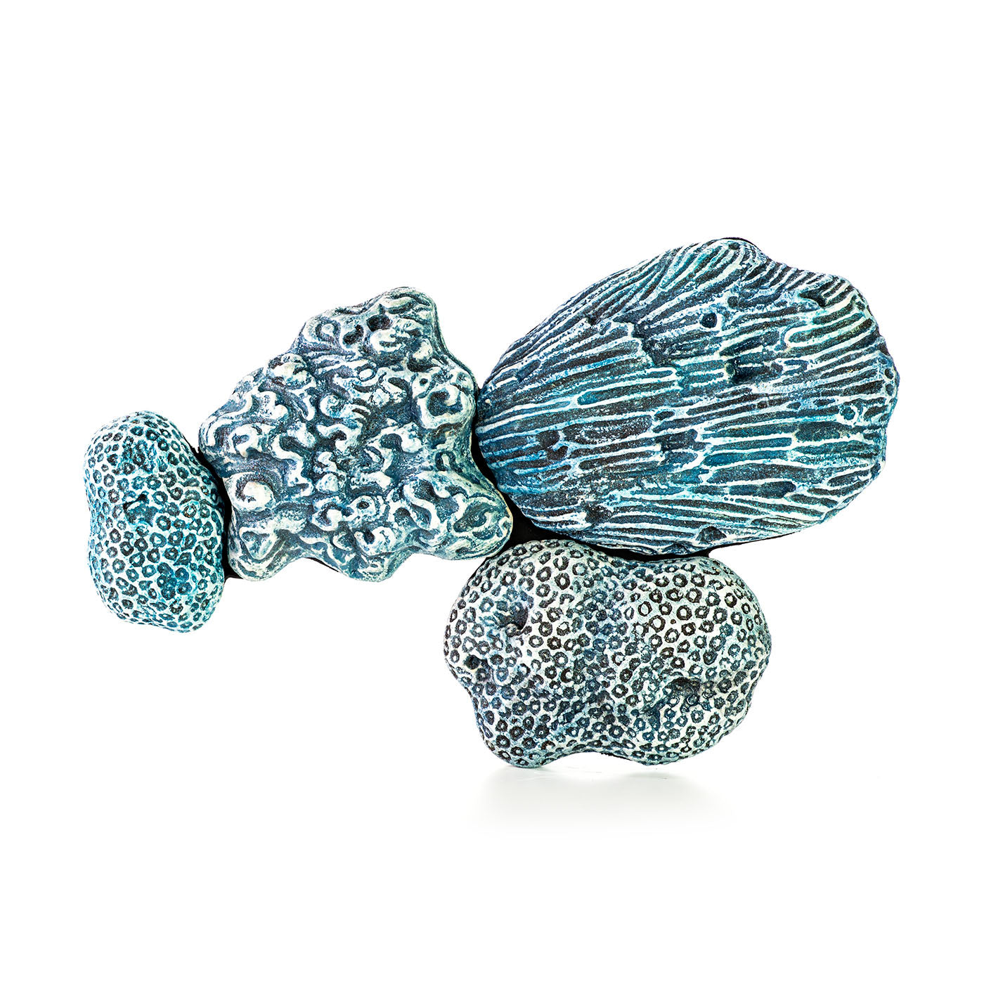 Hand painted ceramic wall decoration depicting marine coral elements in turquoise color.
