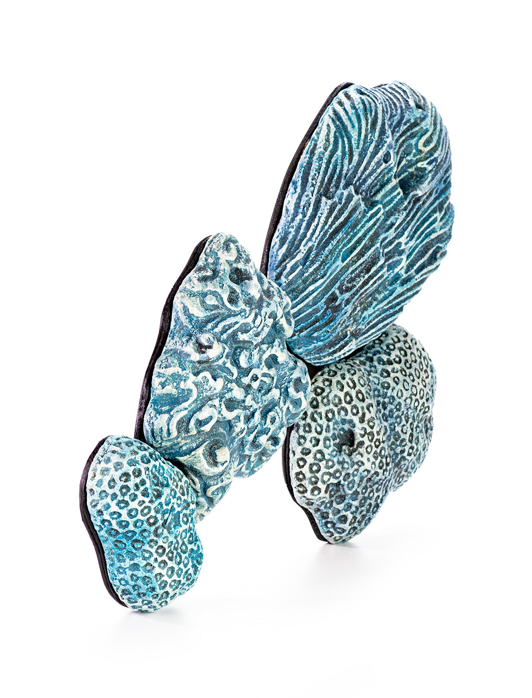 Hand painted ceramic wall decoration depicting marine coral elements in turquoise color.