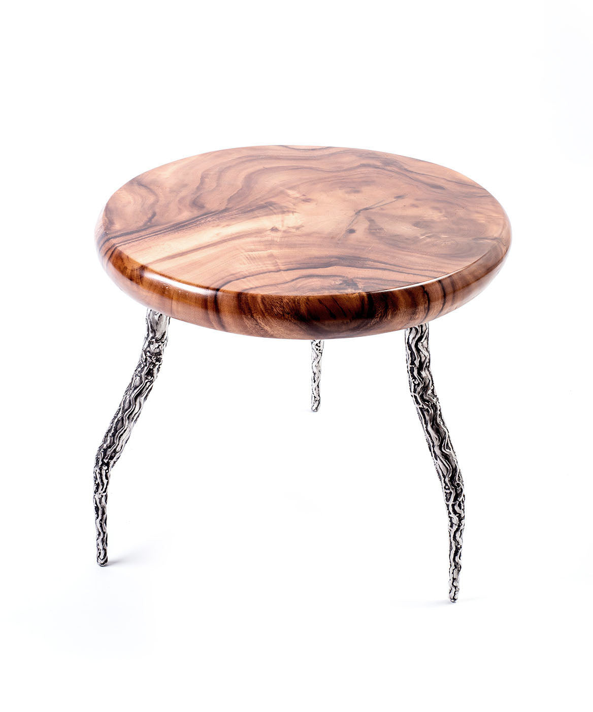 A round teak wood coffee table with a glossy finish and metal support legs with a relief structure. Top view. 