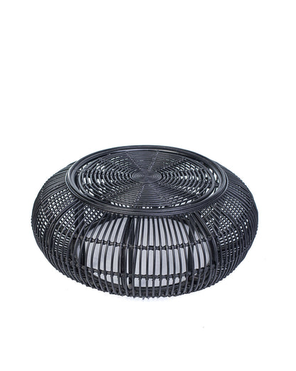 A black rattan coffee table with a glass top, suitable for indoors or outdoors use.