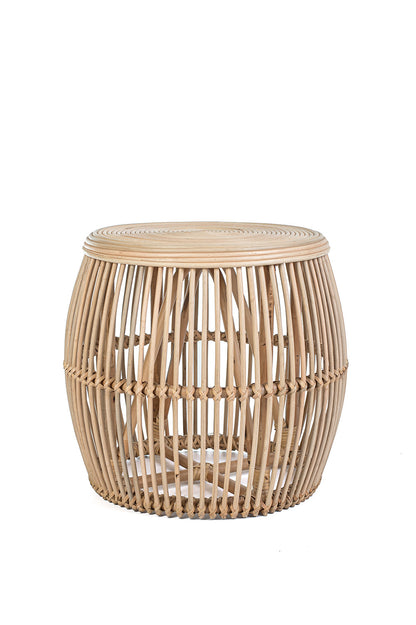 A round natural coffee table made of natural rattan, with a geometric pattern, placed against a white background.