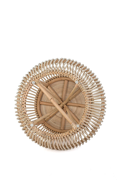 A natural color rattan coffee table with a geometric pattern, featuring a round shape and a slatted design.