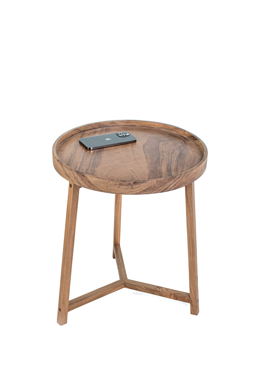 A round teak wood coffee table with a matte finish.