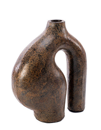 A brown ceramic vase with a unique, irregular shape, suitable for holding dry flowers and decorations.