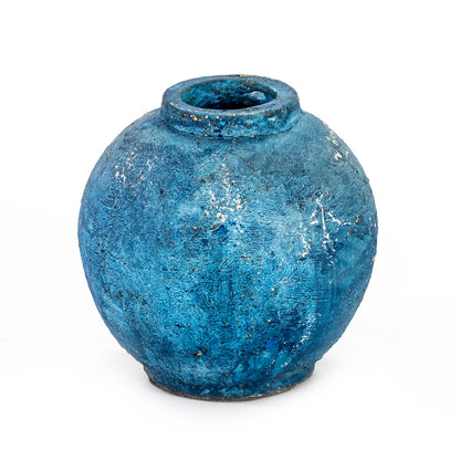 A blue ceramic decorative vase with a rustic finish.