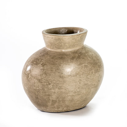 A beige ceramic decorative vase with a smooth, textured surface.