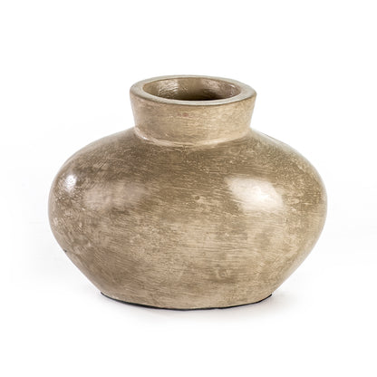 A beige ceramic decorative vase with a smooth, textured surface.