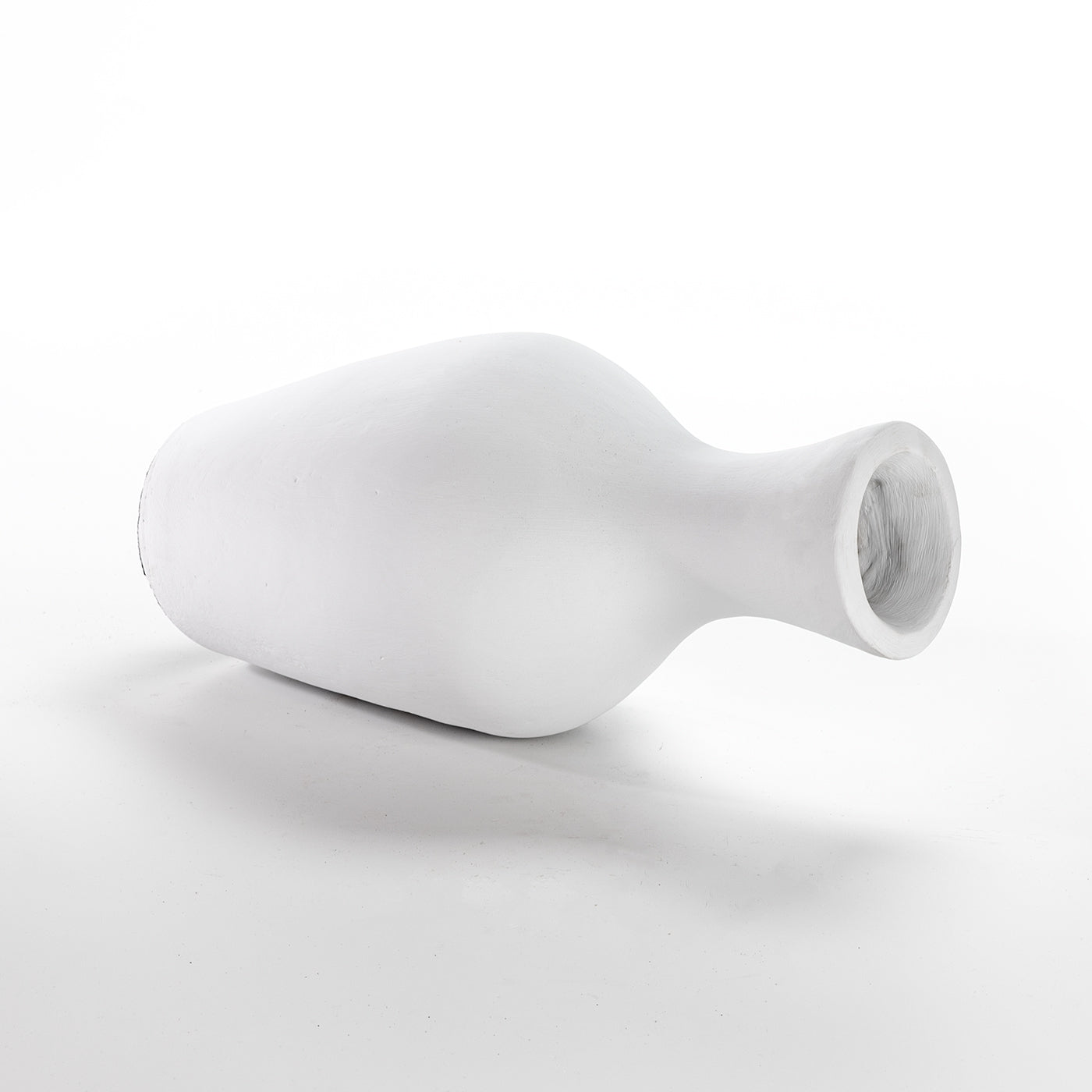 A white ceramic vase in traditional shape displayed against a white background.