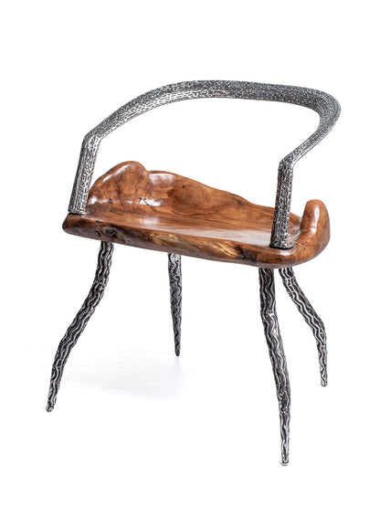 An artistically designed dining chair with a glossy finish on a white background. The chair features a teak wood seat and stainless steel legs with a relief longitudinal structure.