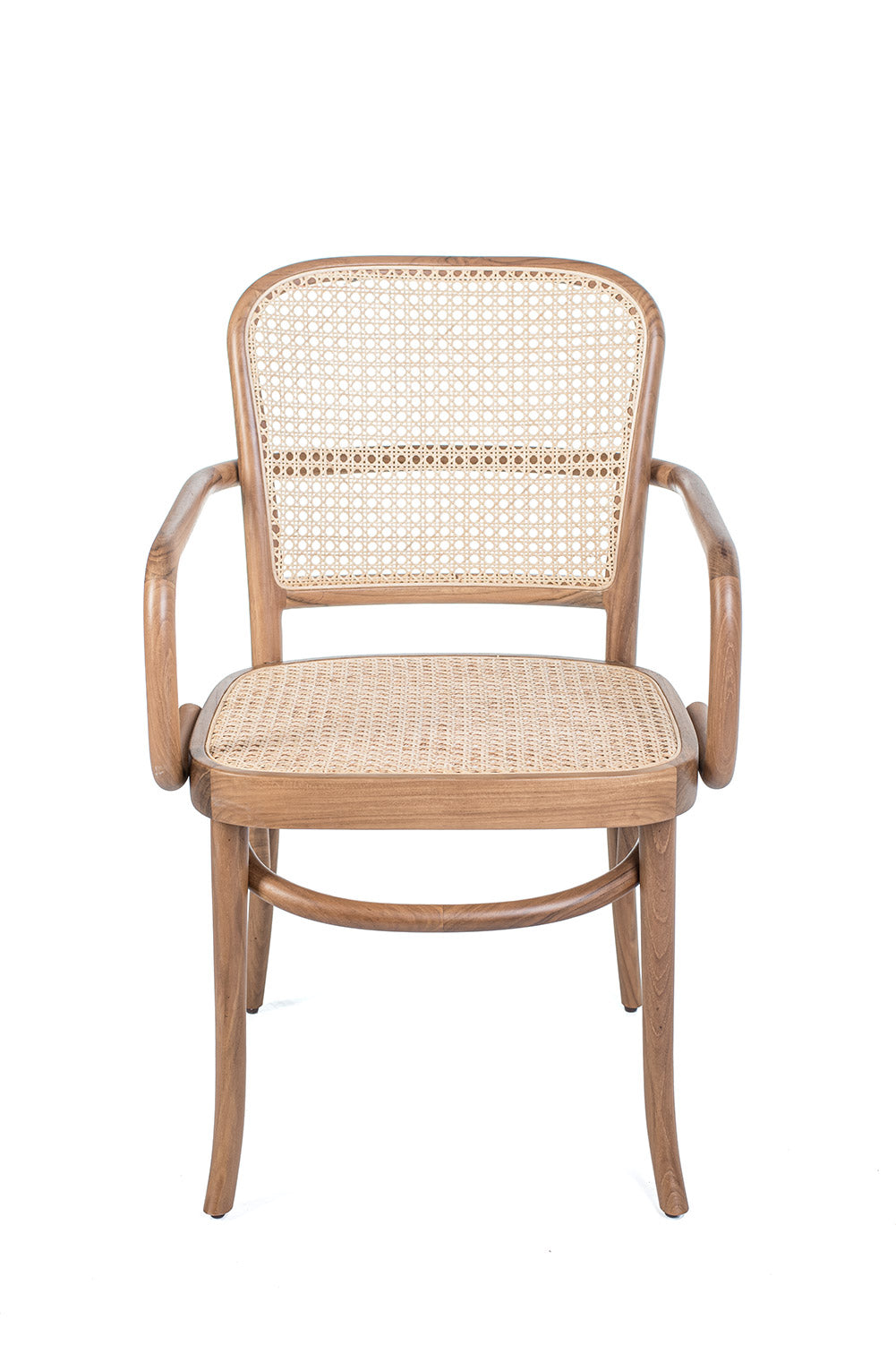 A dining chair with a teak wood frame and rattan seat and backrest, in a natural color.