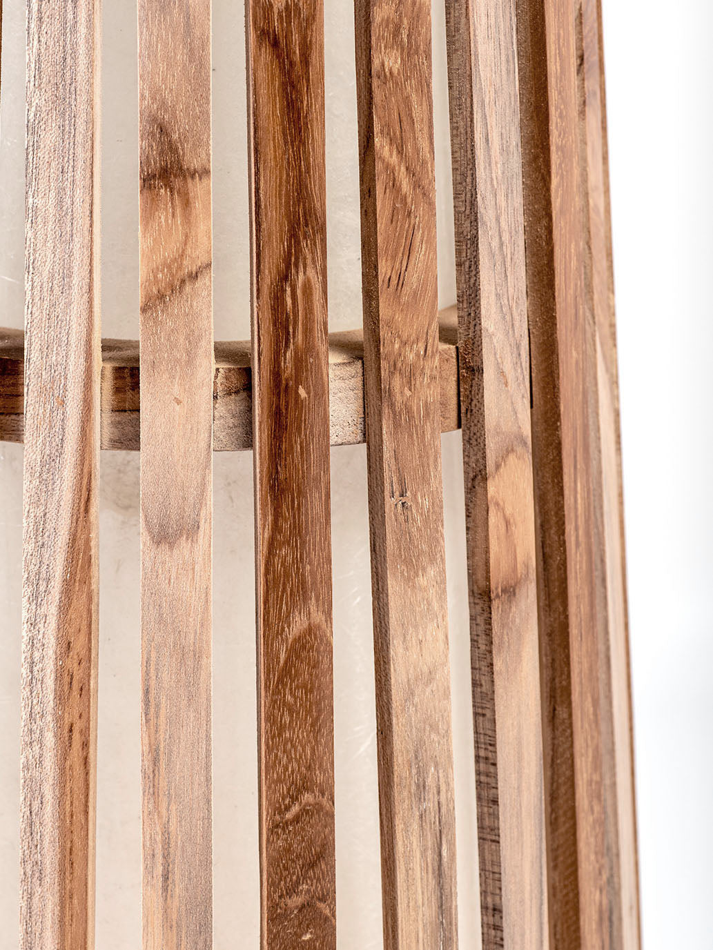 A tall teak wood floor lamp with a smooth glossy finish, conical shape, and a natural wood color. 