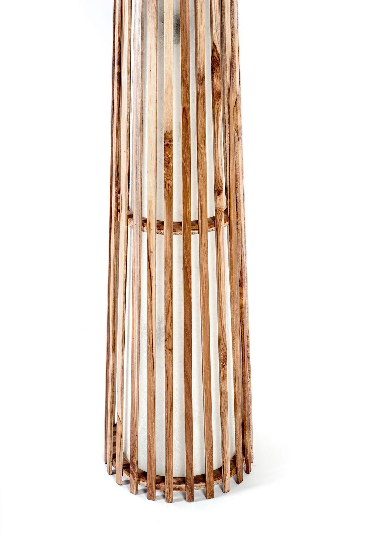 A tall teak wood floor lamp with a smooth glossy finish, conical shape, and a natural wood color. 