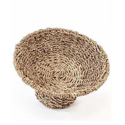 Hand woven fruit basket in natural color, made from seagrass. 