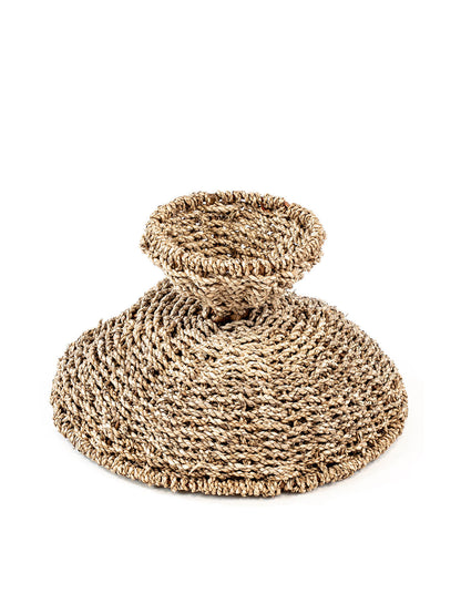 Hand woven fruit basket in natural color, made from seagrass. 