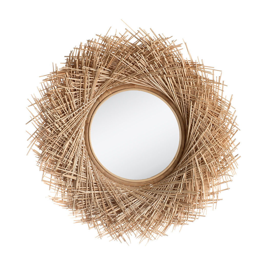 A round mirror with a natural rattan frame, handcrafted and featuring a woven design.