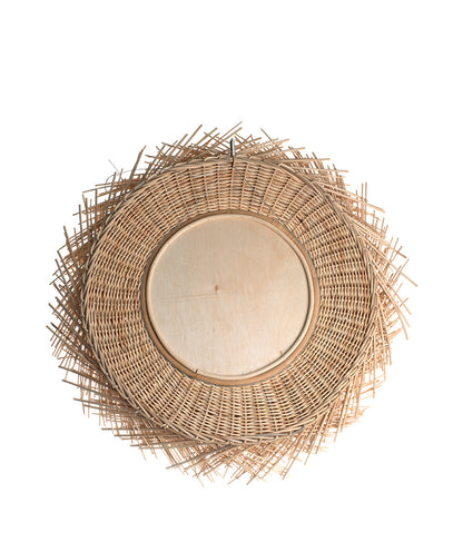 A round mirror with a natural rattan frame, handcrafted and featuring a woven design.