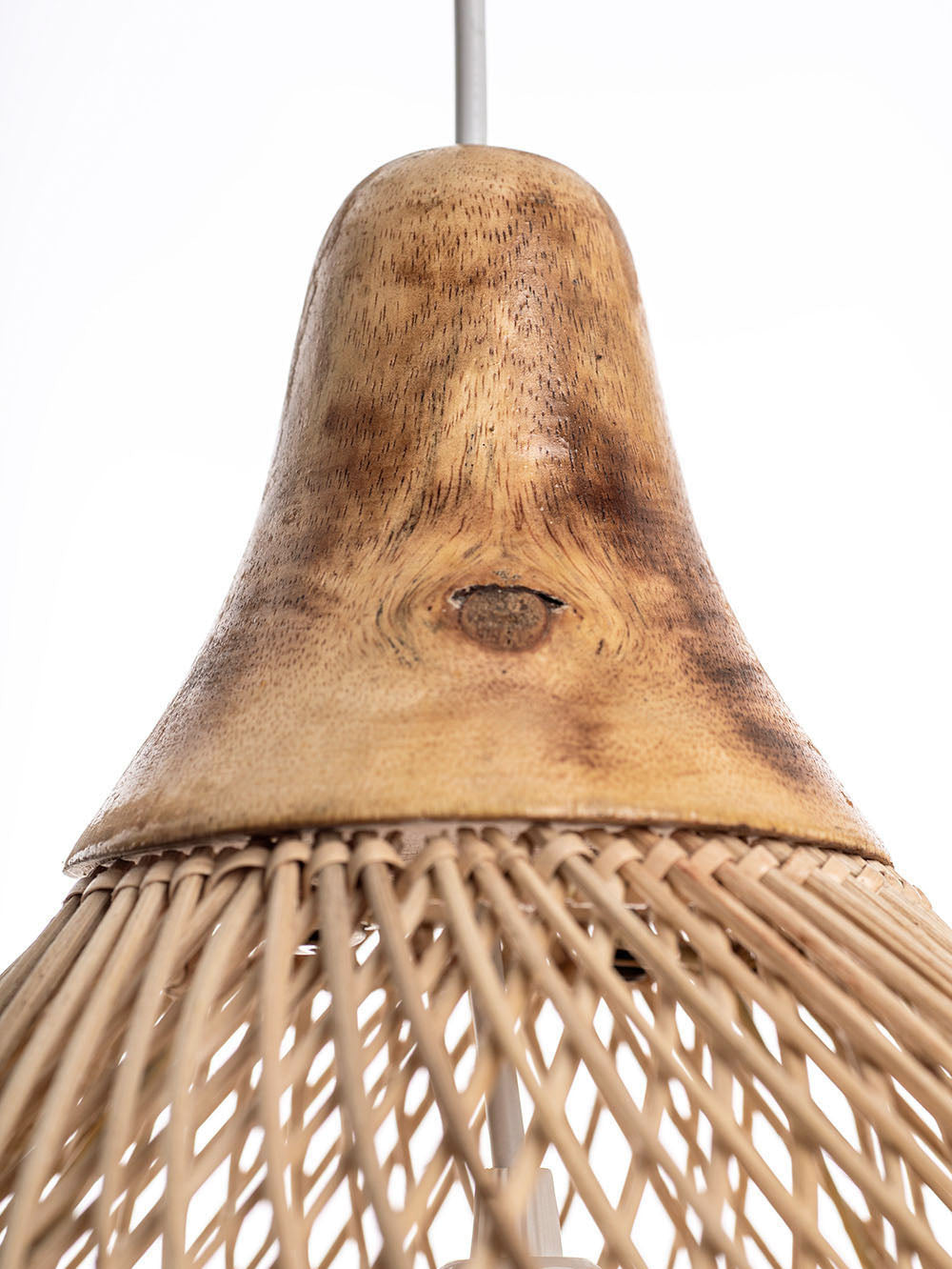 A natural color rattan pendant lamp with a teardrop shape and a wooden top.