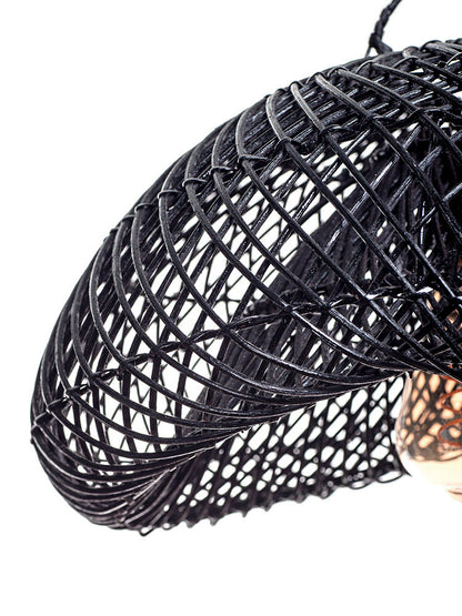 A black pendant lampshade made of rattan, with a rustic design and a visible light bulb at the center.