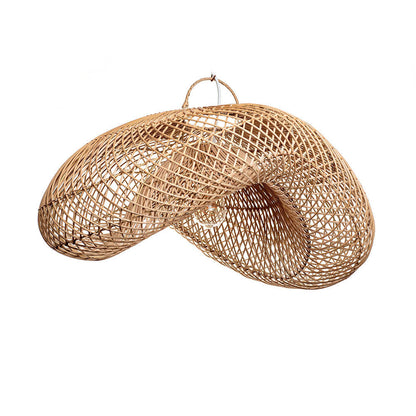 A rustic pendant lampshade made of rattan, in a natural color, with a handmade appearance. It is oval in shape and has visible weaves typical of handcrafted items.