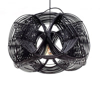 A black rattan ceiling lamp shade with a wave effect design, hand woven and featuring a painted finish.