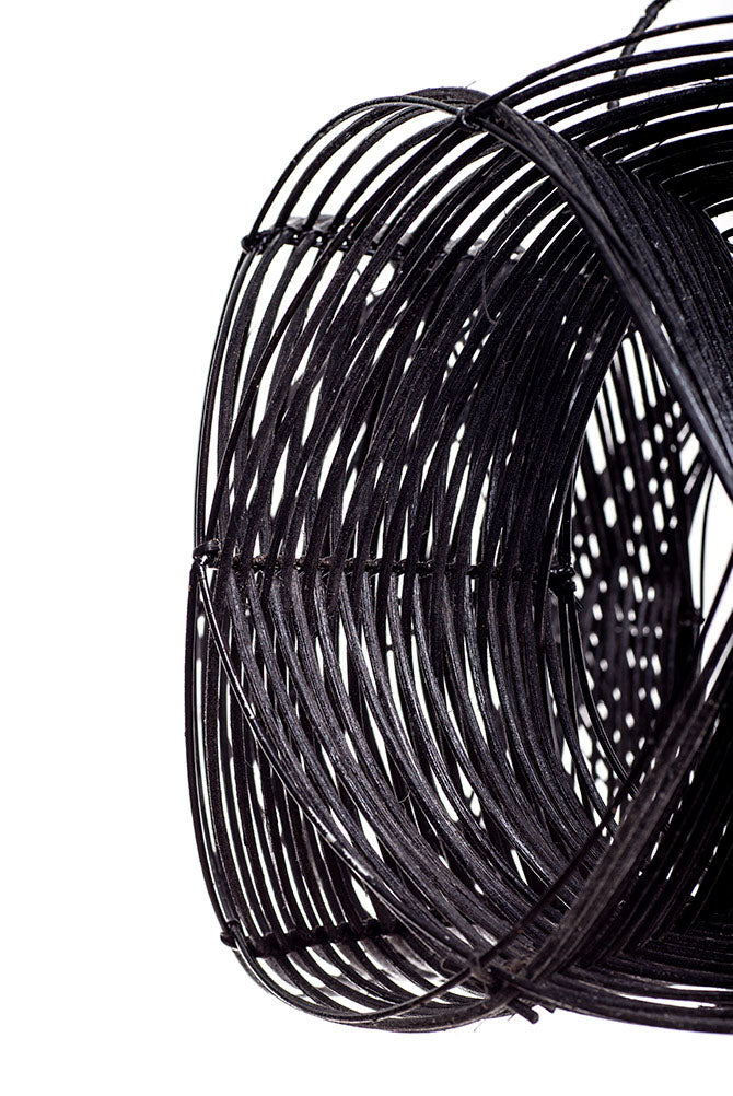 A black rattan ceiling lamp shade with a wave effect design, hand woven and featuring a painted finish.