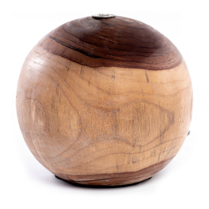 A table lamp with a spherical wooden base and a black linen shade, with natural and black colors. 
