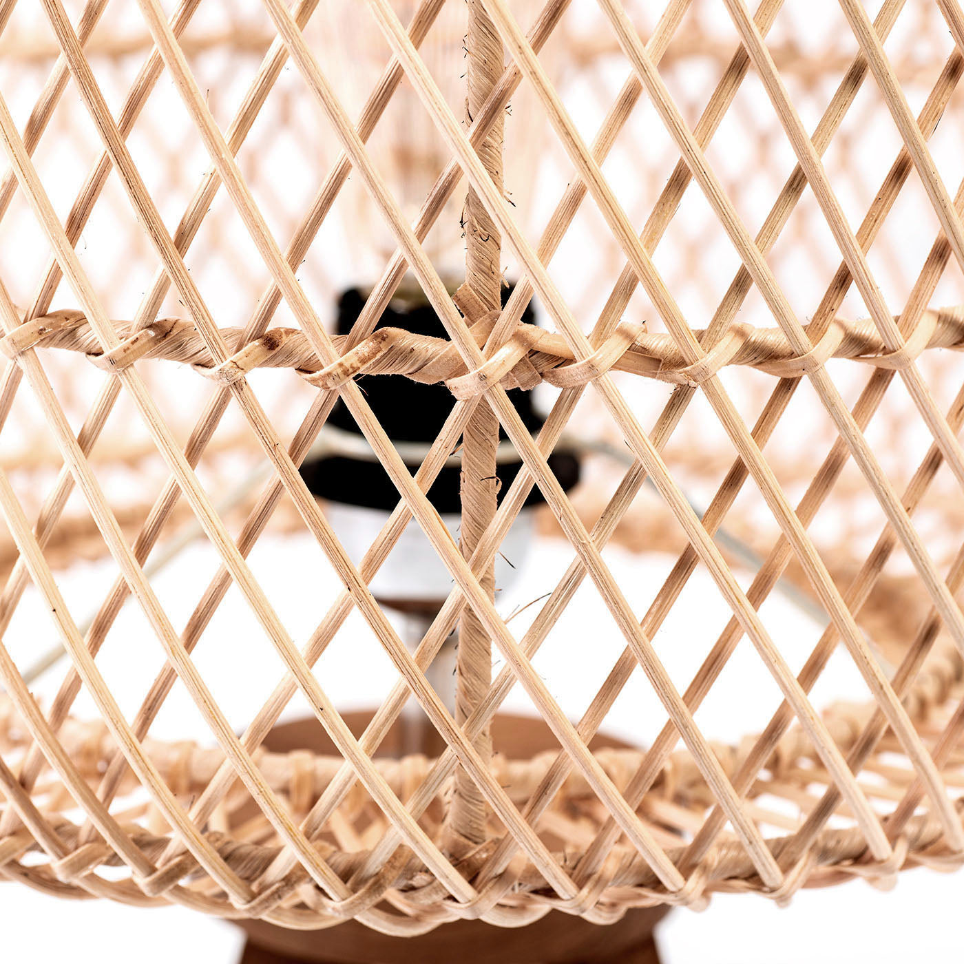 A three-legged table lamp with a teak wood base and a rattan shade, in natural color. The lamp is switched off and placed against a white background.