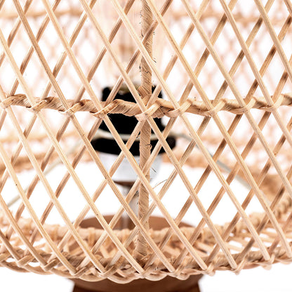 A three-legged table lamp with a teak wood base and a rattan shade, in natural color. The lamp is switched off and placed against a white background.