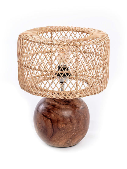A table lamp with a spherical wooden base and a rattan lampshade.